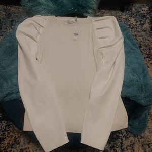 White faux leather sleeves sweater
